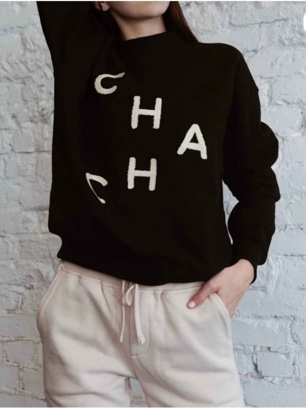Black Crewneck Sweatshirt with Cream Lettering